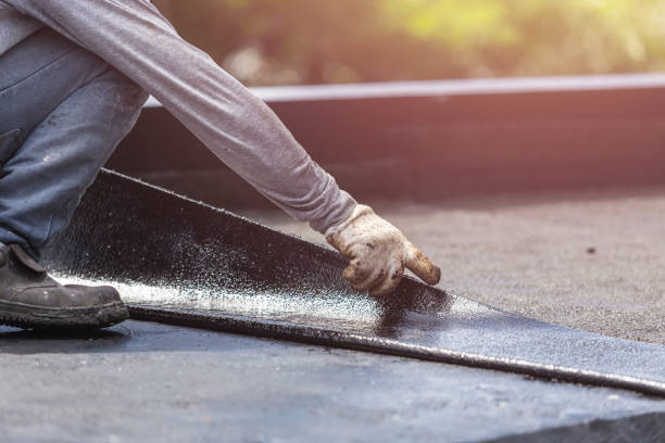 Professional Waterproofing technician working in Warsaw, IN